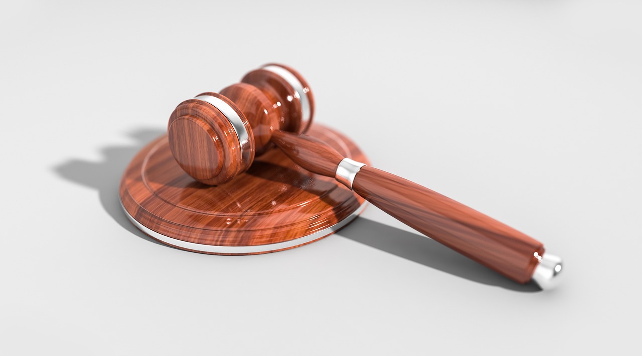 A judge's gavel, representing the German licensing and compliance process